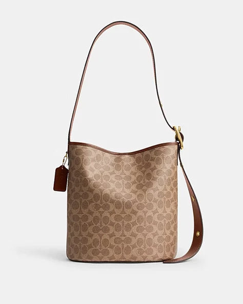 OUVALIA Luxury Edit | Coach BLEECKER BUCKET BAG IN SIGNATURE CANVAS