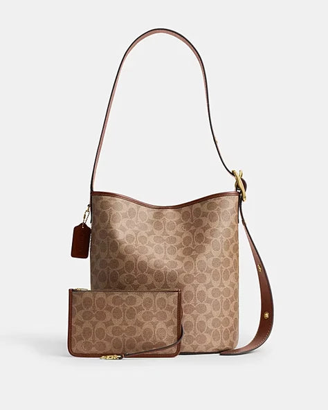 OUVALIA Luxury Edit | Coach BLEECKER BUCKET BAG IN SIGNATURE CANVAS