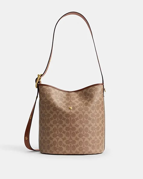 OUVALIA Luxury Edit | Coach BLEECKER BUCKET BAG IN SIGNATURE CANVAS