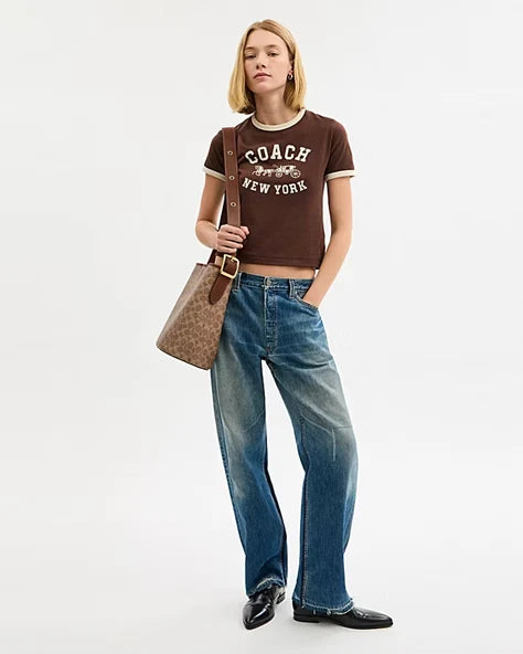 OUVALIA Luxury Edit | Coach BLEECKER BUCKET BAG IN SIGNATURE CANVAS
