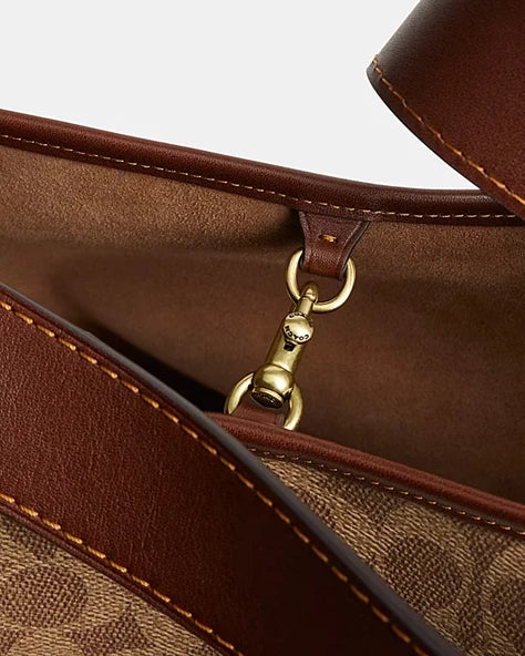 OUVALIA Luxury Edit | Coach BLEECKER BUCKET BAG IN SIGNATURE CANVAS