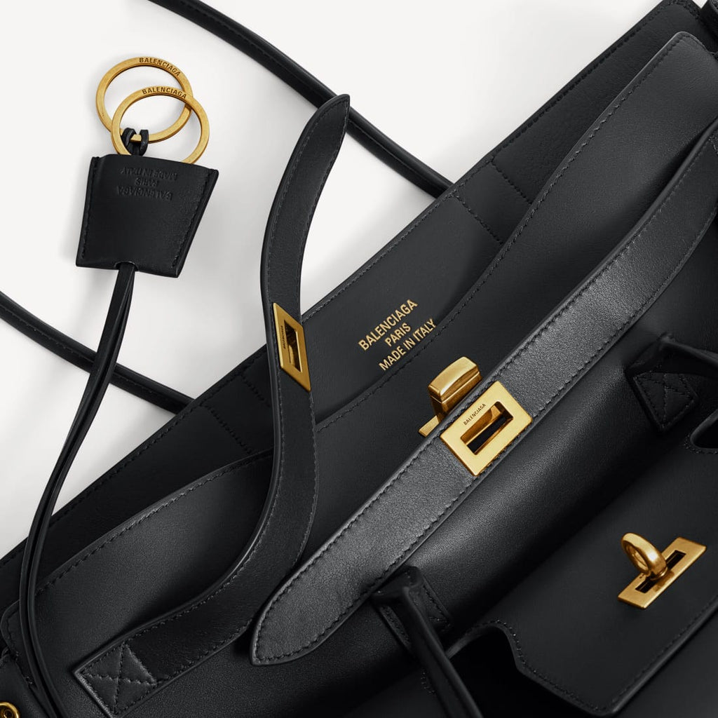 OUVALIA Luxury Edit | Balenciaga Bel Air Carry All Bag Medium In Black Smooth Calfskin, Aged-Gold Hardware