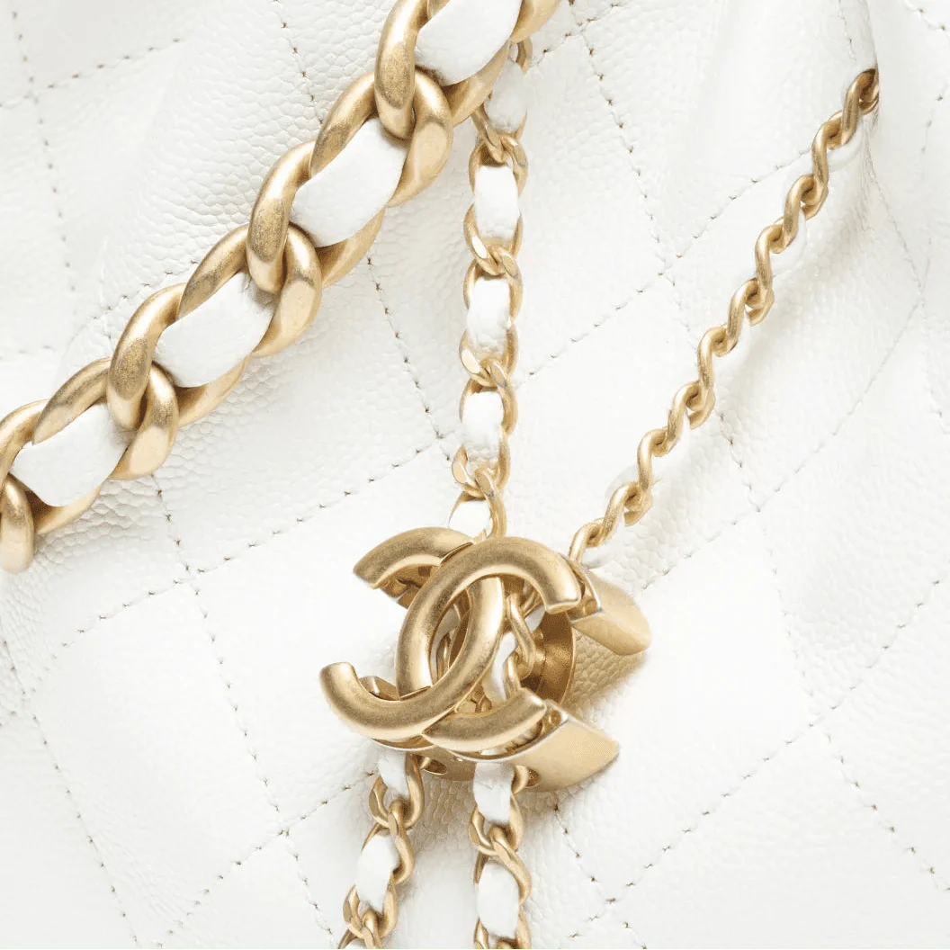 OUVALIA Luxury Edit | Chanel 25 Large Handbag Gold-Tone Metal White