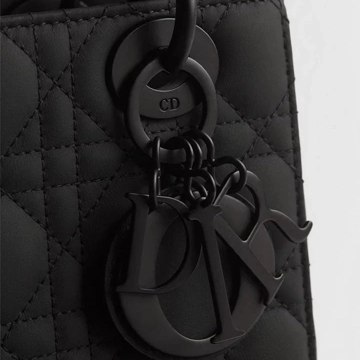 OUVALIA Luxury Edit | Christian Dior Small bag Completely Matte Black Calfskin With a Cannage Pattern