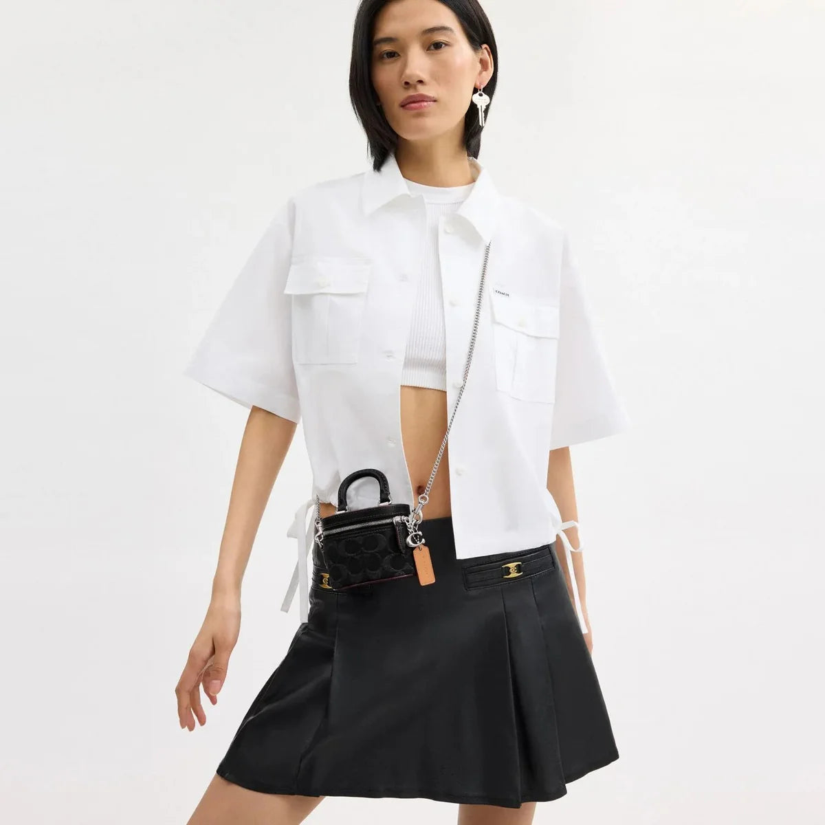 OUVALIA Luxury Edit | Coach Signature Denim Trail Crossbody Bag
