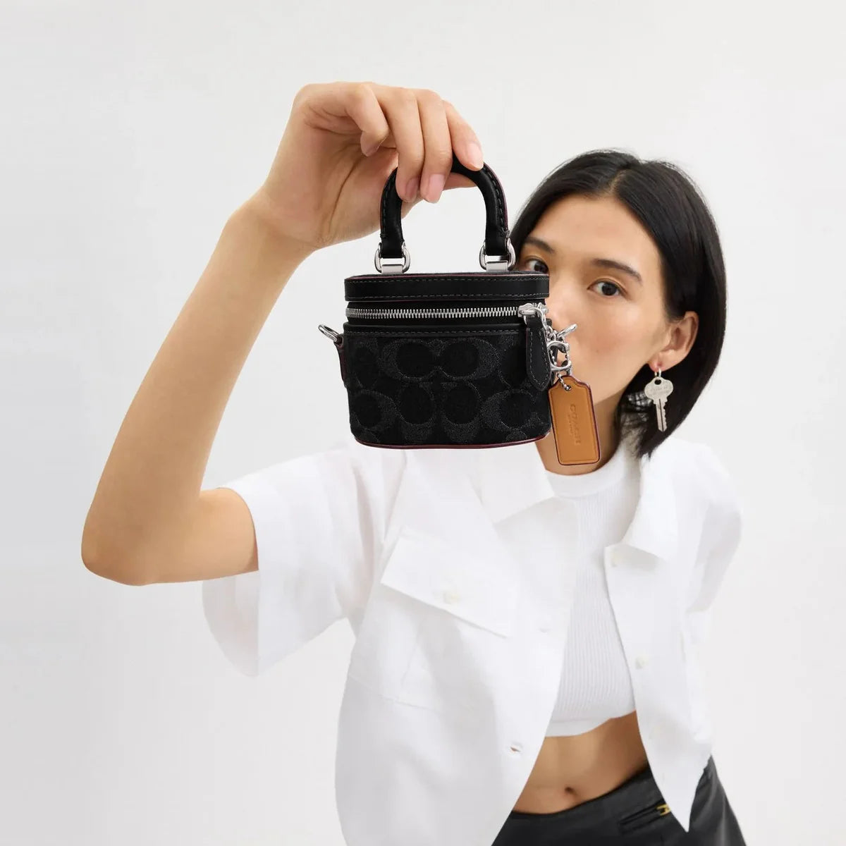 OUVALIA Luxury Edit | Coach Signature Denim Trail Crossbody Bag