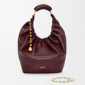 OUVALIA Luxury Edit | Loewe Medium Squeeze Bag Dark Burgundy