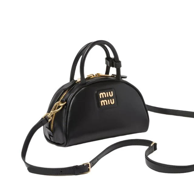 OUVALIA Luxury Edit | Miu Miu Leather Top-Handle Bag With Metal Lettering Logo And Gold-Tone Hardware Black