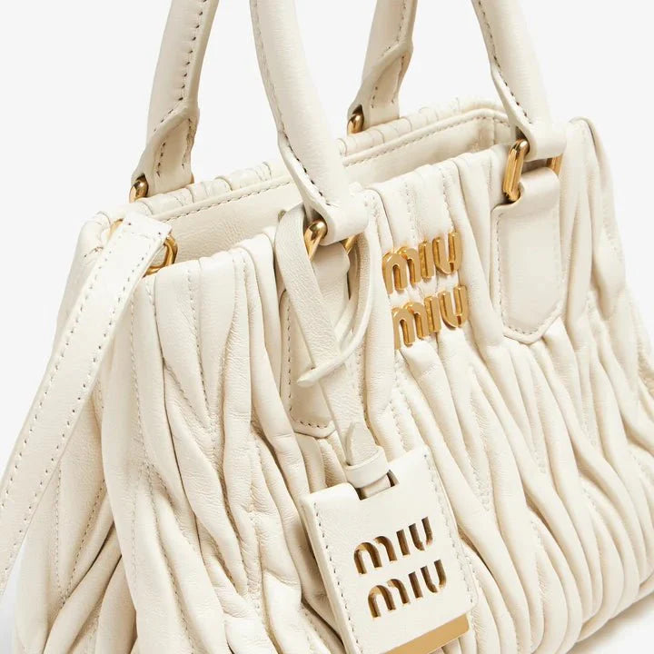 OUVALIA Luxury Edit | Miu Miu Matelassé Leather Mini Handbag – Off White