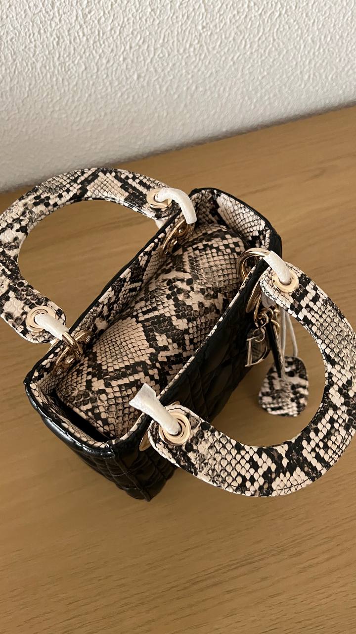 OUVALIA Luxury Edit | Dior Small Lady Dior Bag Black Cannage Lambskin and Multicolor Python Light Gold Hardware