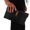 OUVALIA Luxury Edit | Yves Saint Laurent Uptown Patent Leather Clutch Black Bag